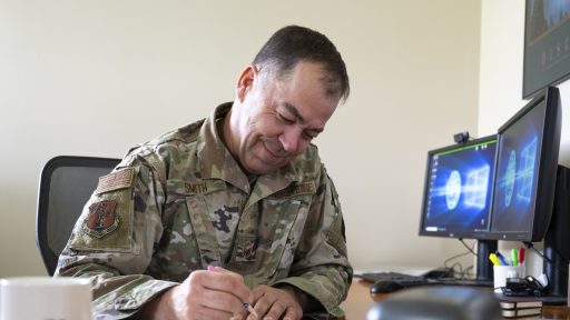senior service member writing