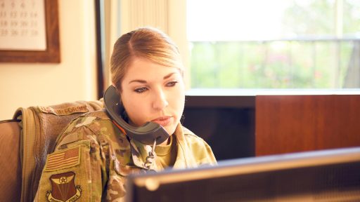 A service member talks on the phone