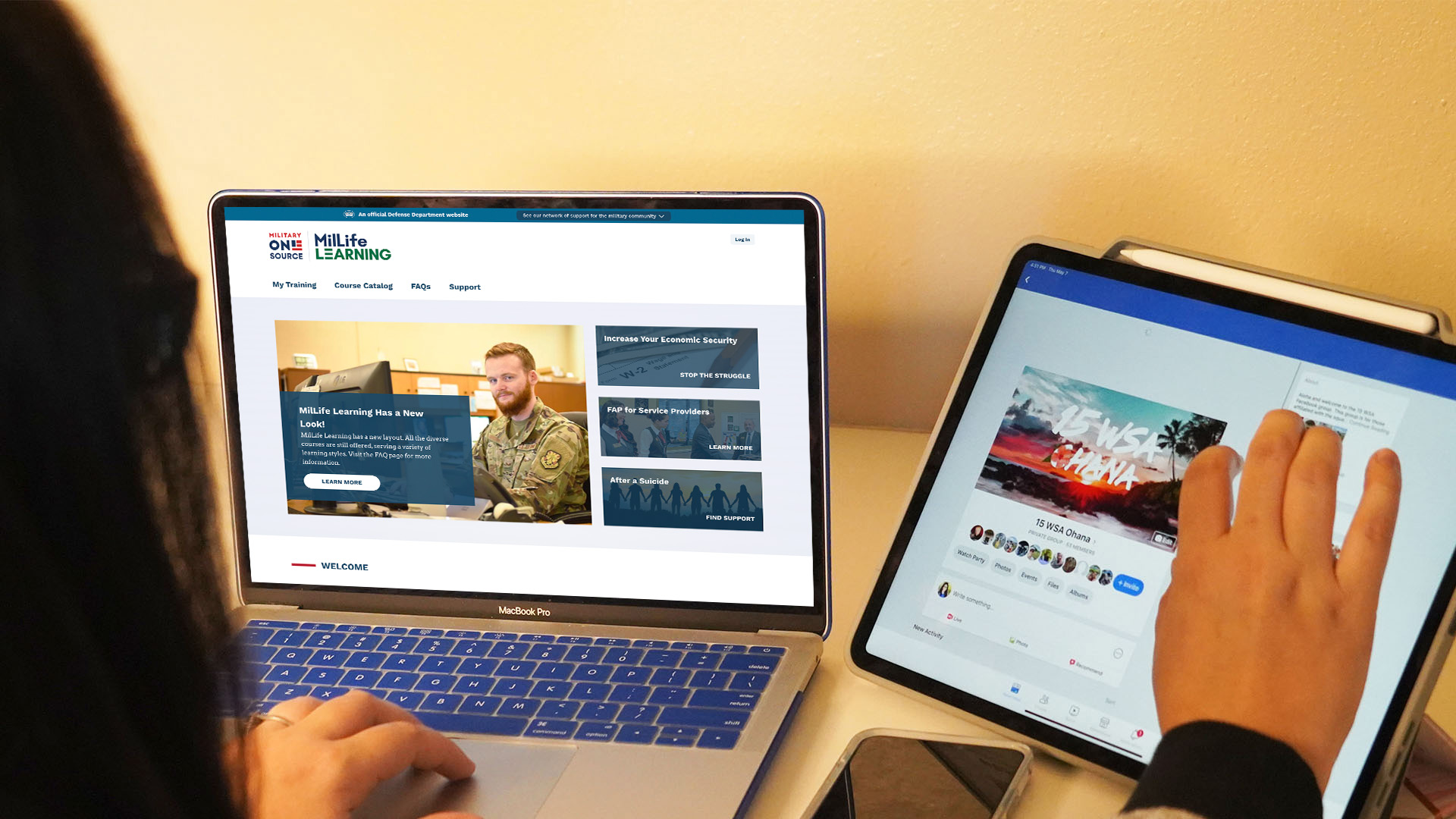 Woman views MilLife Learning website