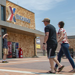 Couple walks into exchange