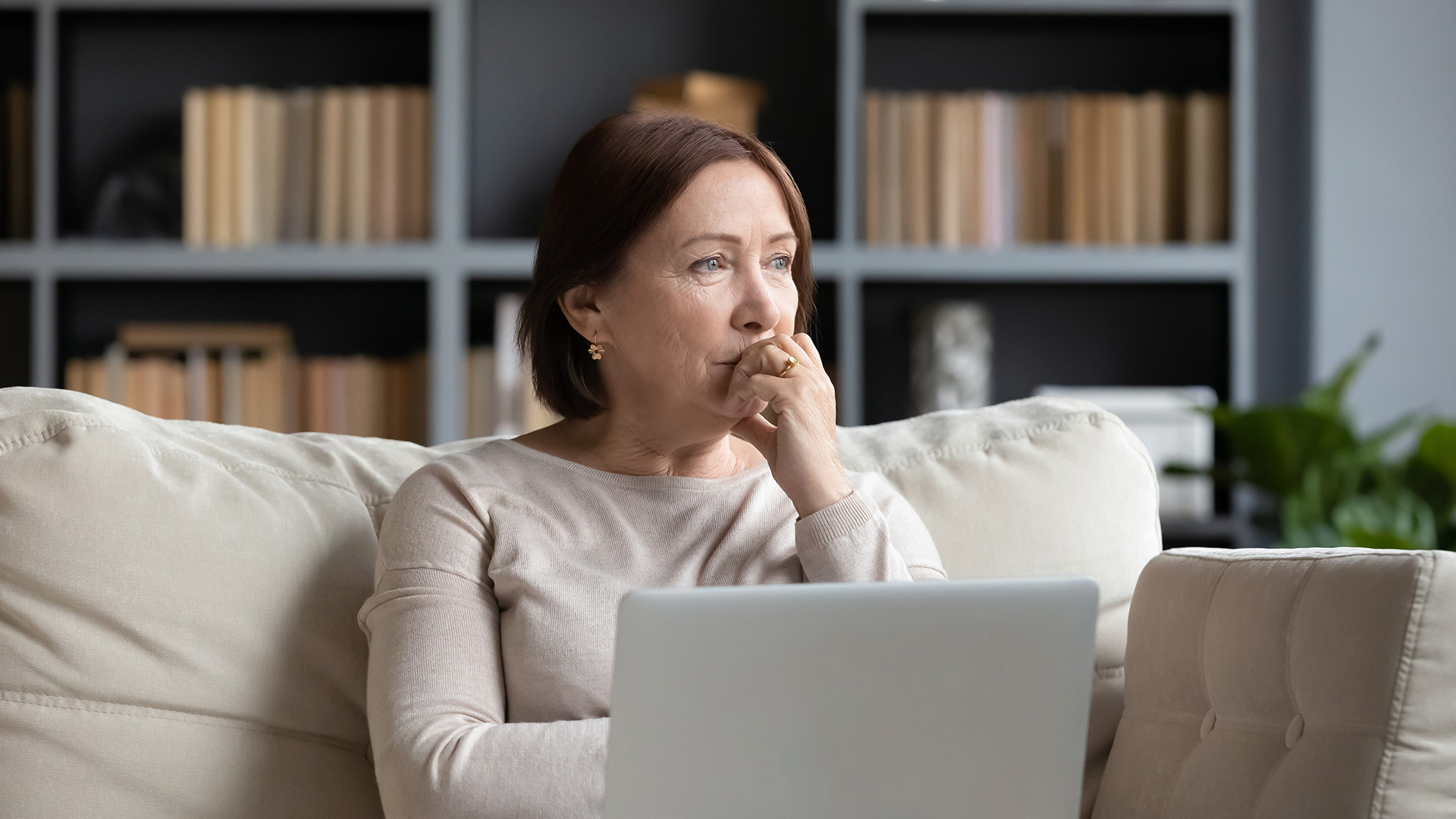 woman in home with computer