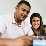 Man and woman on laptop