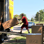 man moves boxes