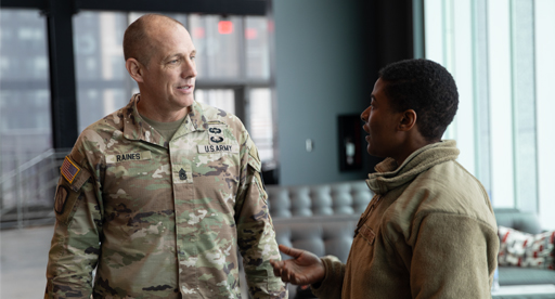 Service member talking to a sponsor