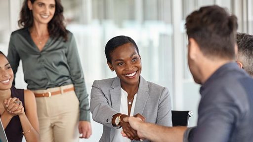 coworkers shaking hands