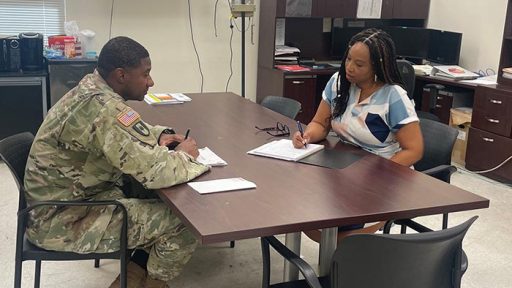 service member talking with counselor
