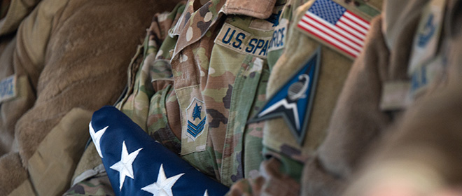 U.S. Space Force uniform and American flag