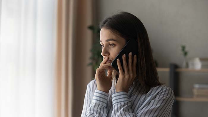 woman on phone at home