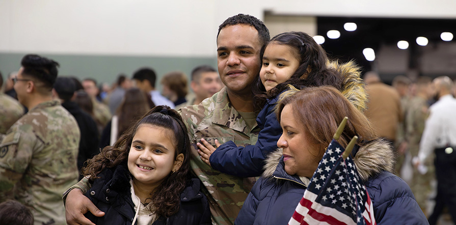 service member with family