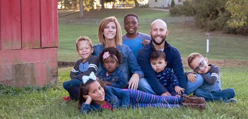 family sitting outside