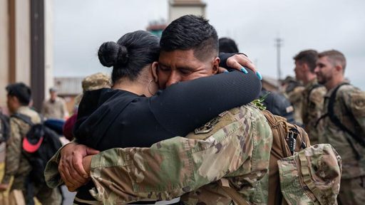 service member hugging