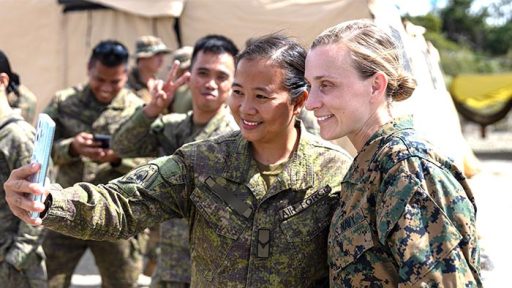 service members taking selfie