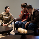 Casualty assistance officer meeting with family