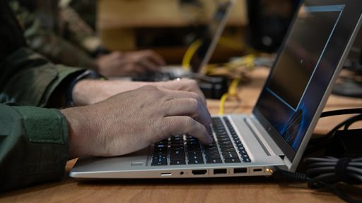 Service member on computer