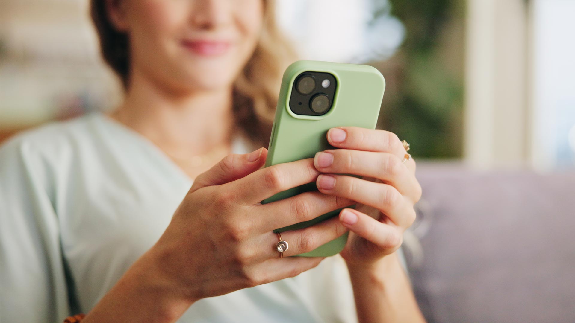 woman holding mobile phone