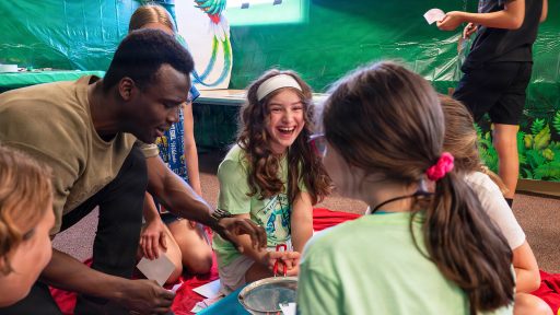 children doing experiments at camp