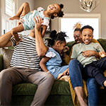 family playing on couch