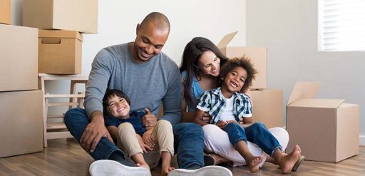 family with moving boxes