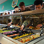 Service members getting food