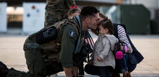 Service member reunited with family