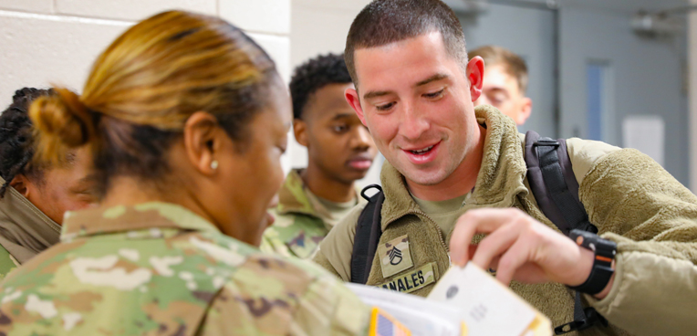 service member collecting paperwork