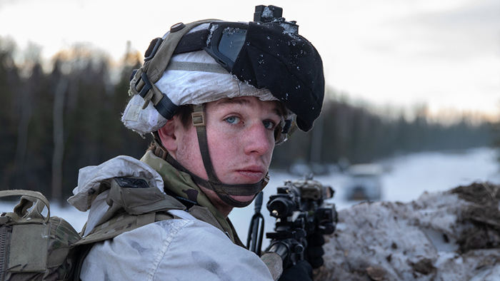 service member looking at camera