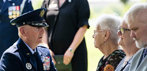 Air Force general presents folded flag to widow