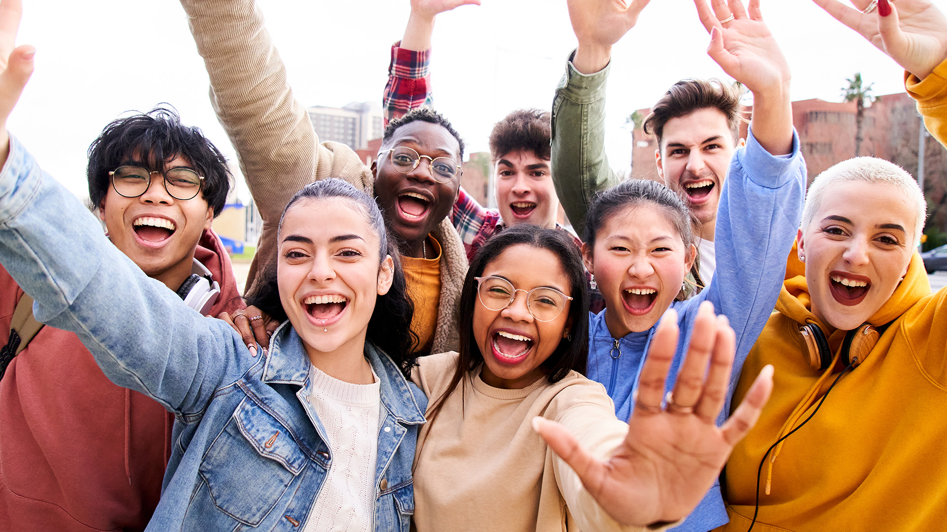 A group of adolescents smiling