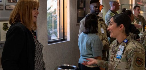 person talking with service member