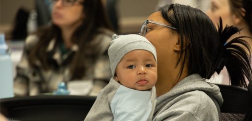 Mother holding infant