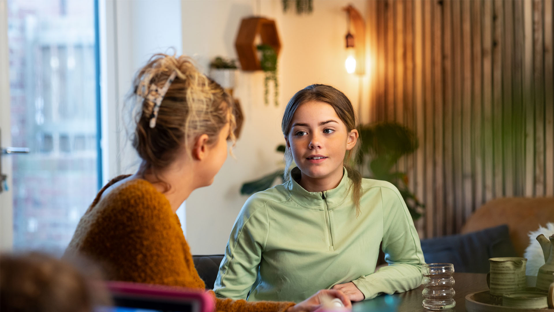 Mother talking to teen daughter