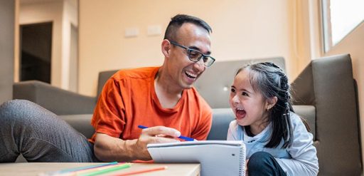 person playing with child