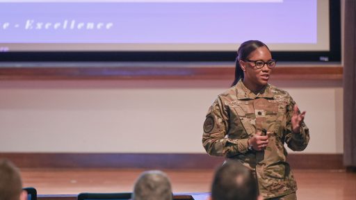 Service member speaks to group
