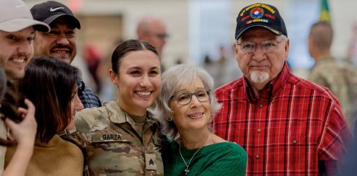 service member with family