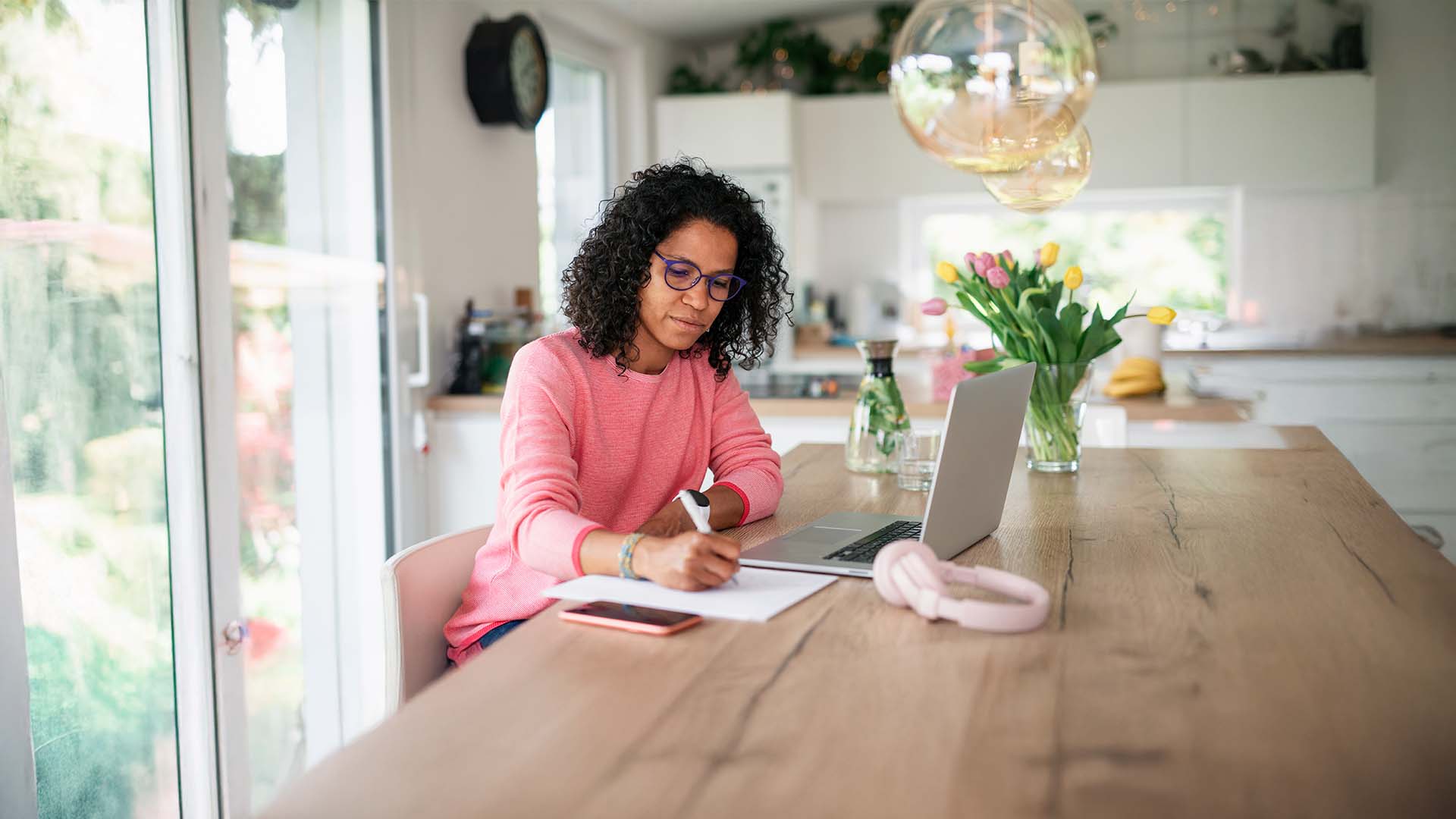 Woman reviewing survivor tax documents