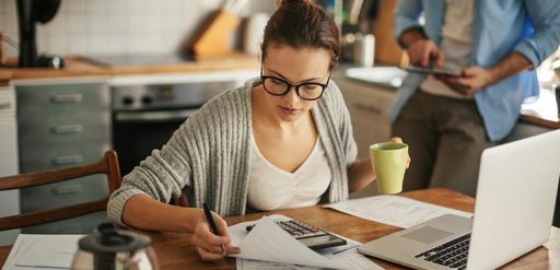 woman working on finances at home