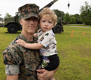service member with child
