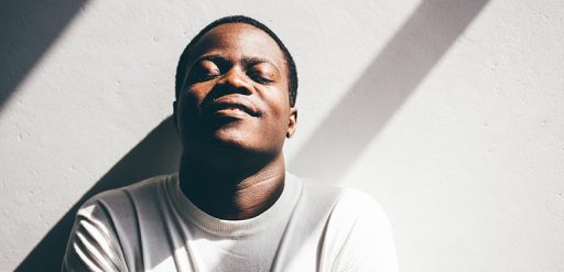 man smiling in sunlight