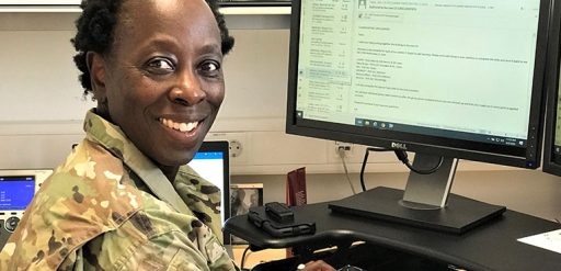 service member at computer