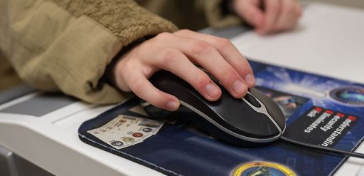 service member on computer