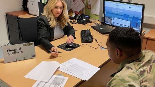 Service member reviewing finances with advisor