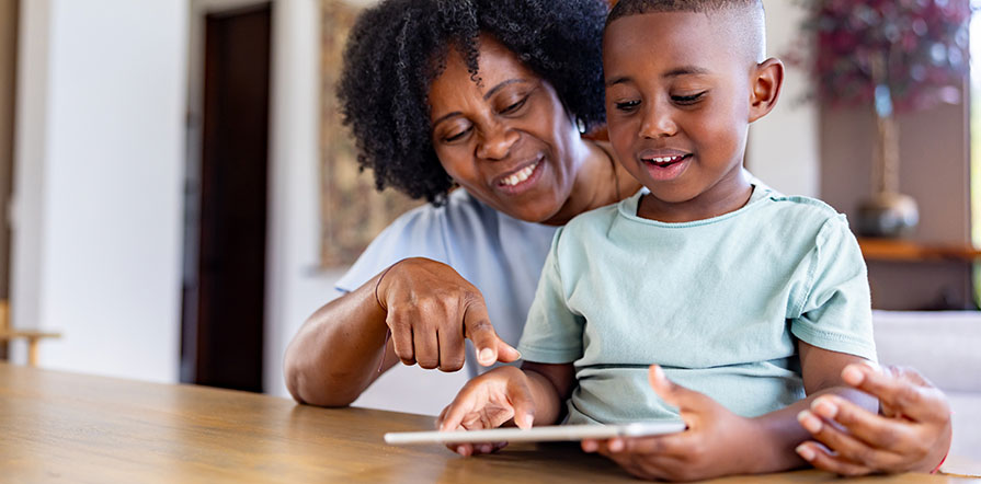 woman interacting with young child