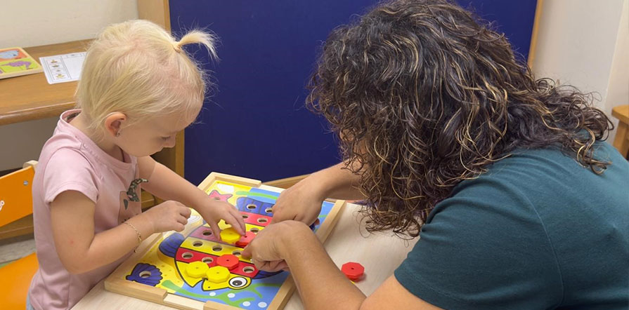 child working on speech language skills