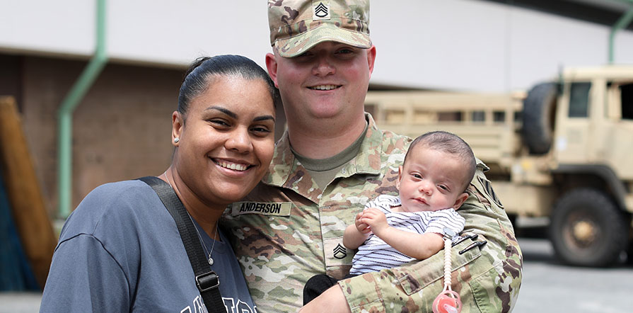 couple with newborn baby