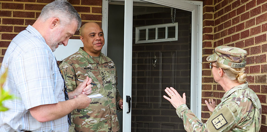 speaking to service member outside his home