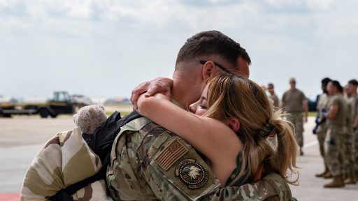 military couple hugs