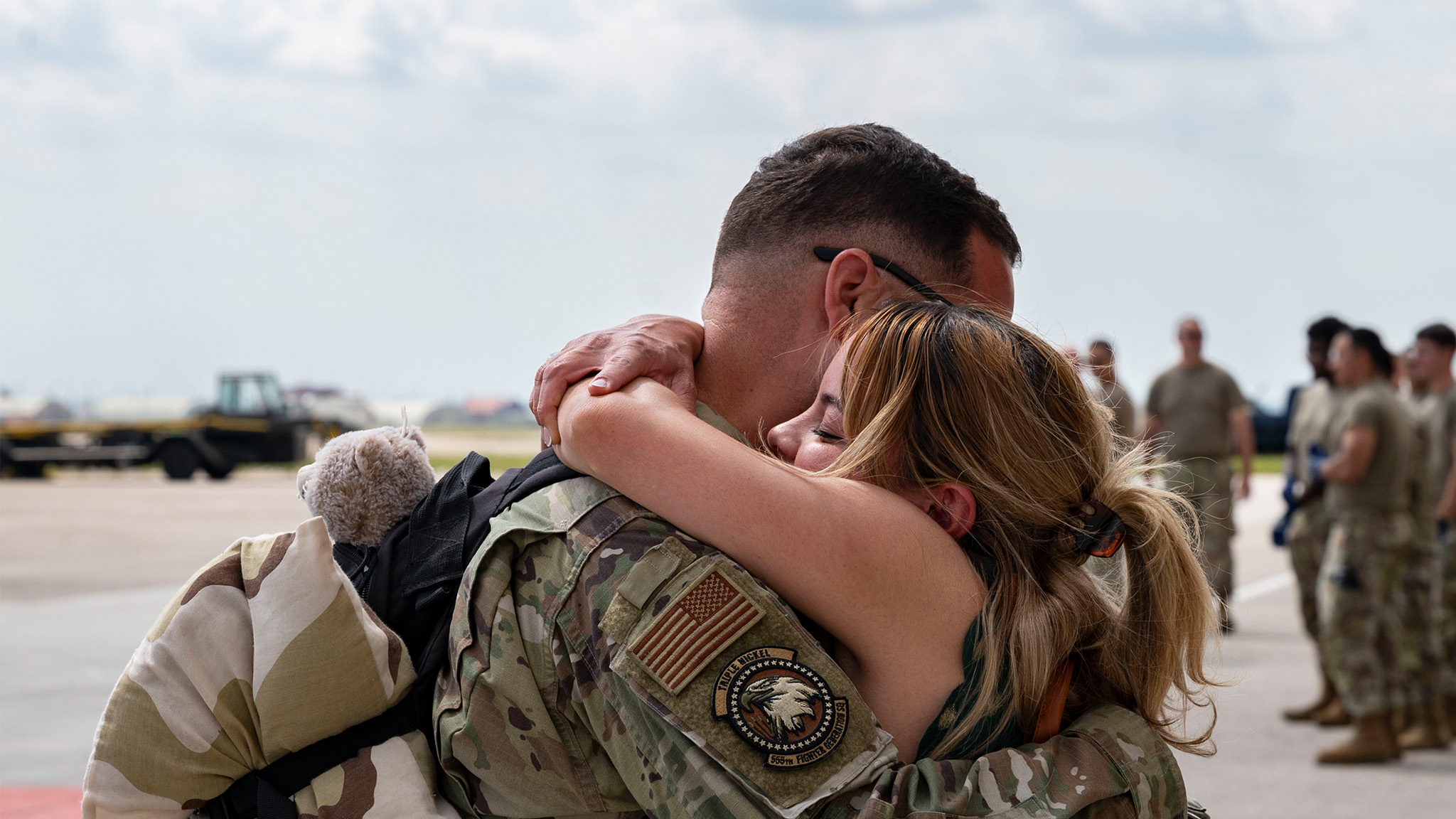 military couple hugs