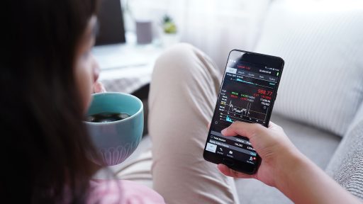 Reviewing investment stocks on phone