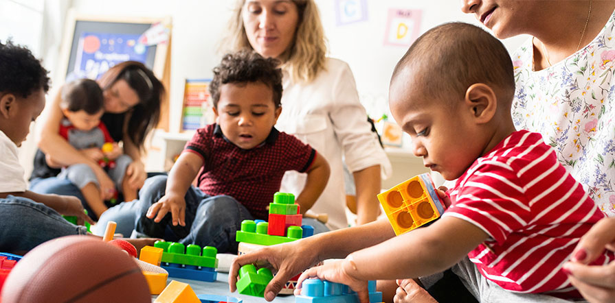 toddlers playing with toys