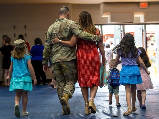 service member returns to family